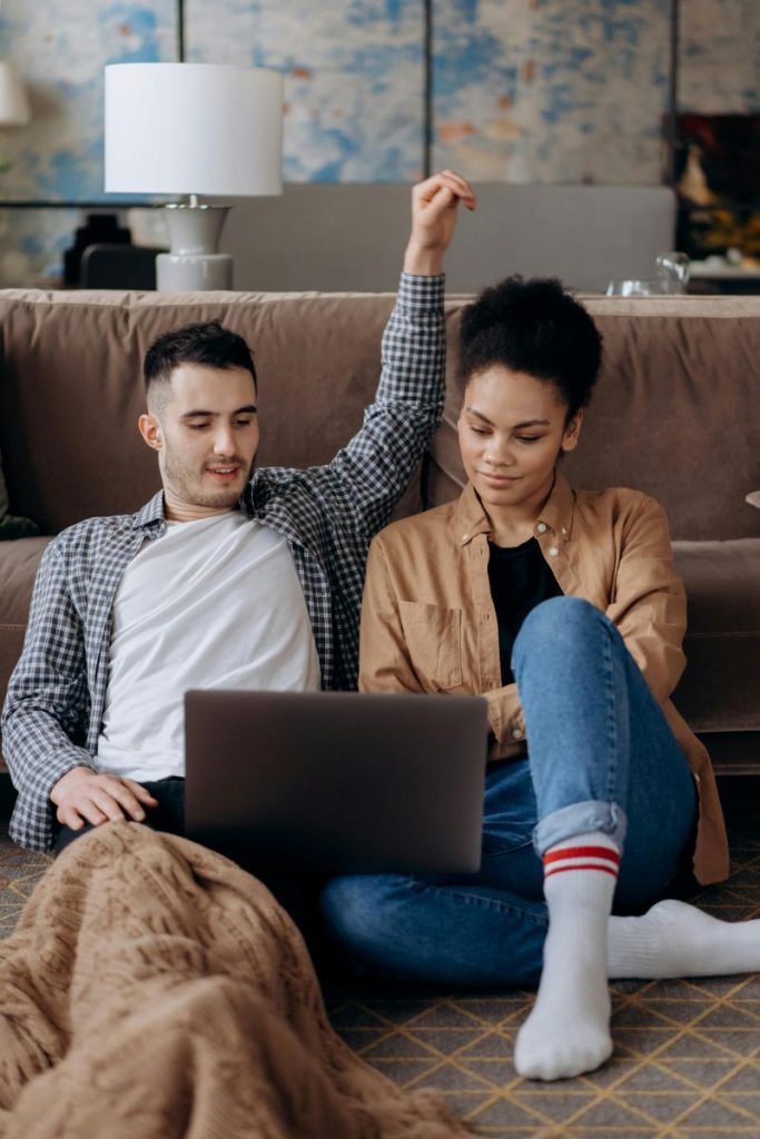 virtual-relationship-counselling a couple in front of a laptop for virtual relationship counselling