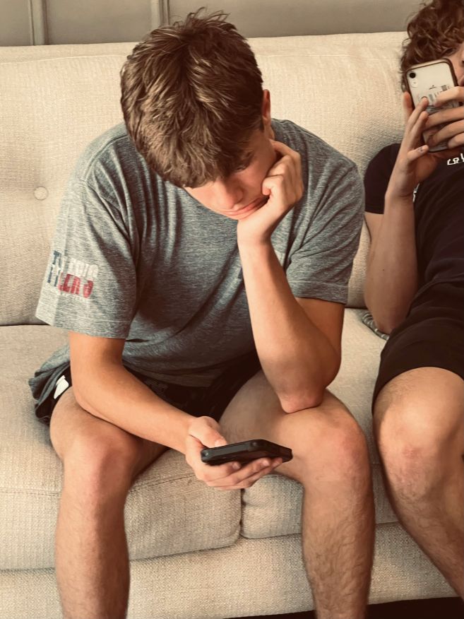 parenting a teenager when they are ignoring you by focusing on their phone and their friends