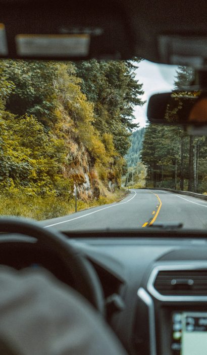 icbc-approved-counsellors-vancouver A peaceful view of Vancouver nature through a car window, symbolizing a calm nervous system and a confident return to driving after trauma therapy