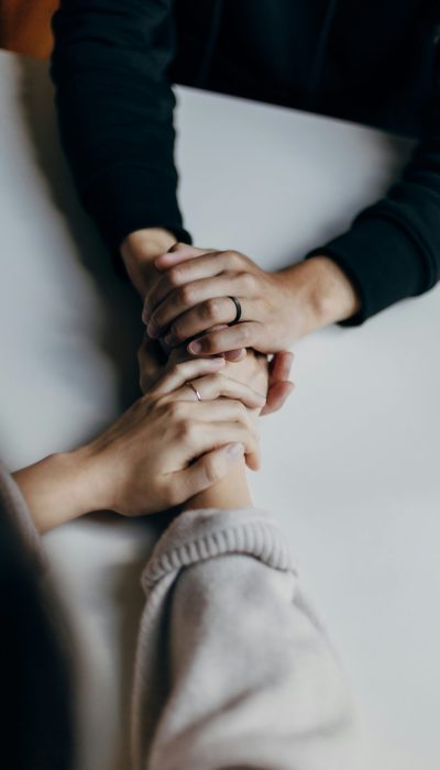 attachment-based-therapy-vancouver couples holding hands after couples counselling in kitsilano about attachment