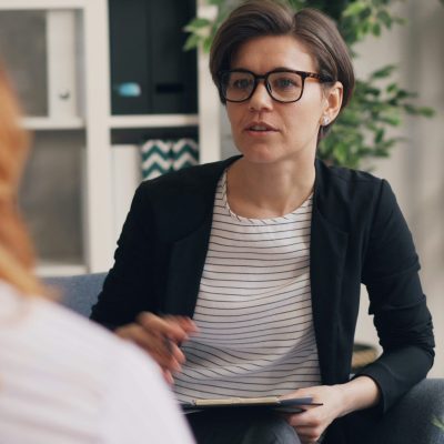 understanding-attachment-styles-counselling-vancouver A therapist at Haven Wellness Collective discussing attachment styles in a therapy session in Kitsilano